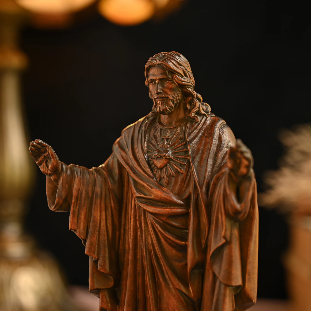 Close-up of a 3D carved beechwood Jesus statue showing detailed wood carving