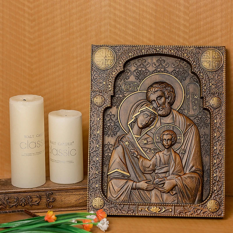 Holy Family hand-carved wooden wall icon styled with candles and flowers