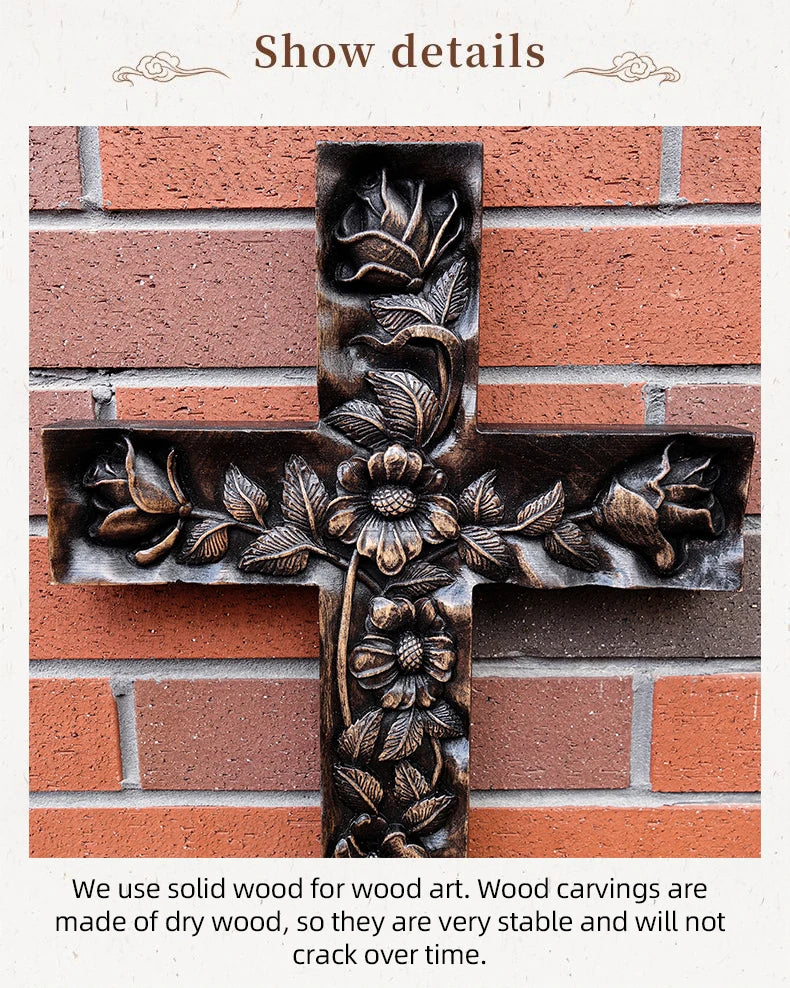 Close-up detail shot of the dark, carved wooden cross with floral and rose relief, placed against a textured red brick wall. The image includes the text 'Show details' and a caption confirming the use of 'solid wood for wood art' and 'dry wood' to ensure stability and prevent cracking.