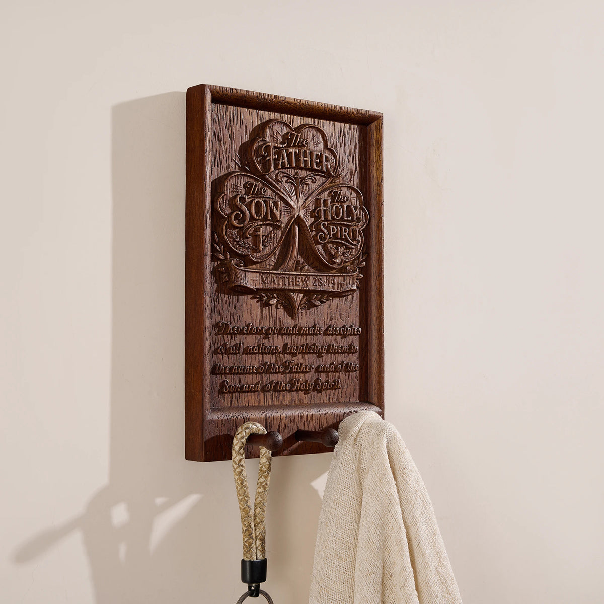 Tree of Life Trinity wooden wall plaque with hooks mounted on wall, styled with keys