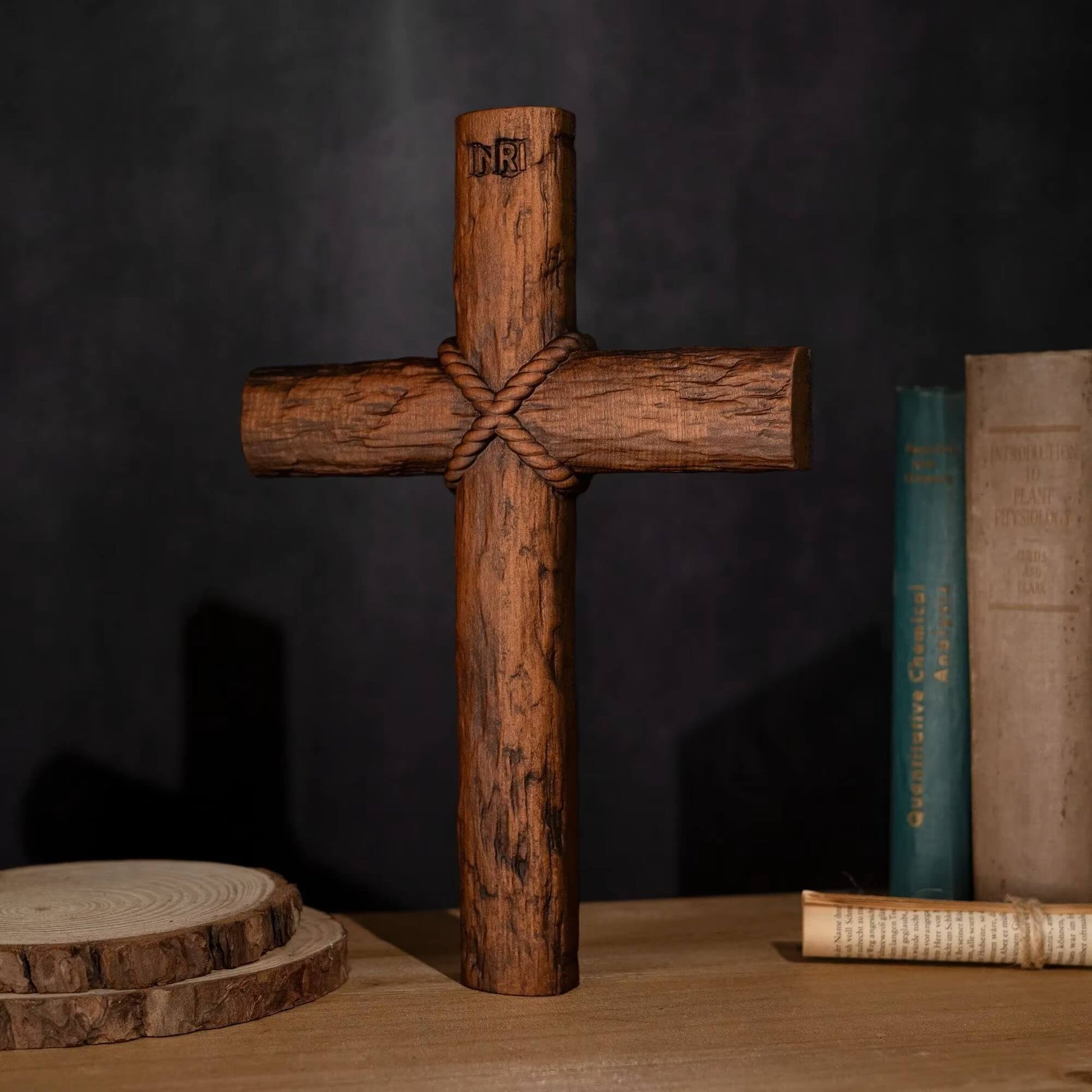 Wooden cross with knotted design on a dark background