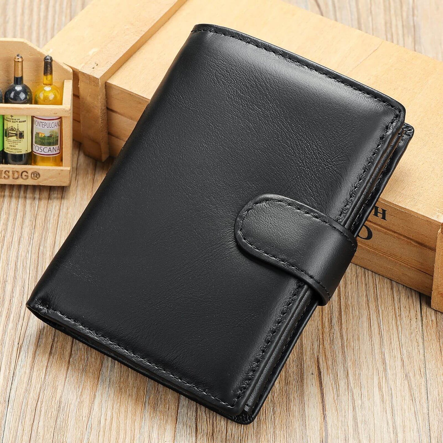 Genuine leather RFID black wallet detail display showing ID window, snap button and large bill compartment