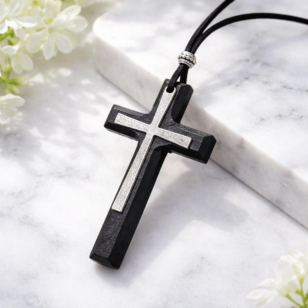 Black wood cross necklace with silver metal overlay on leather cord
