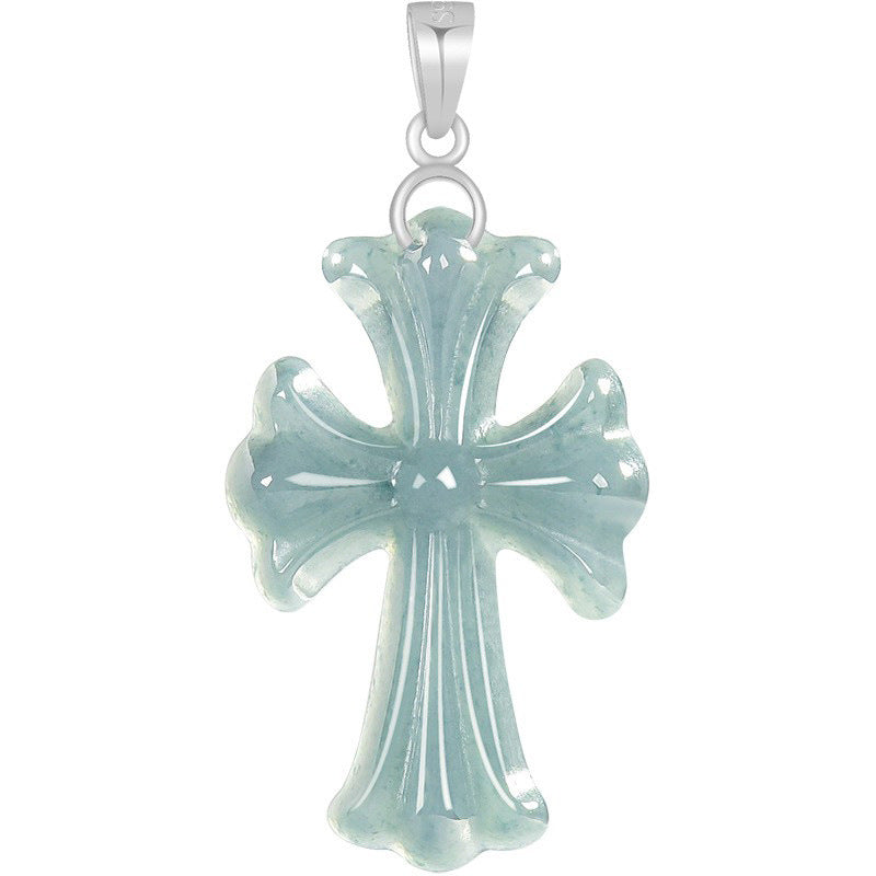 A light blue-water Type A jadeite translucent cross pendant with a polished silver bail, shown against a plain white background.