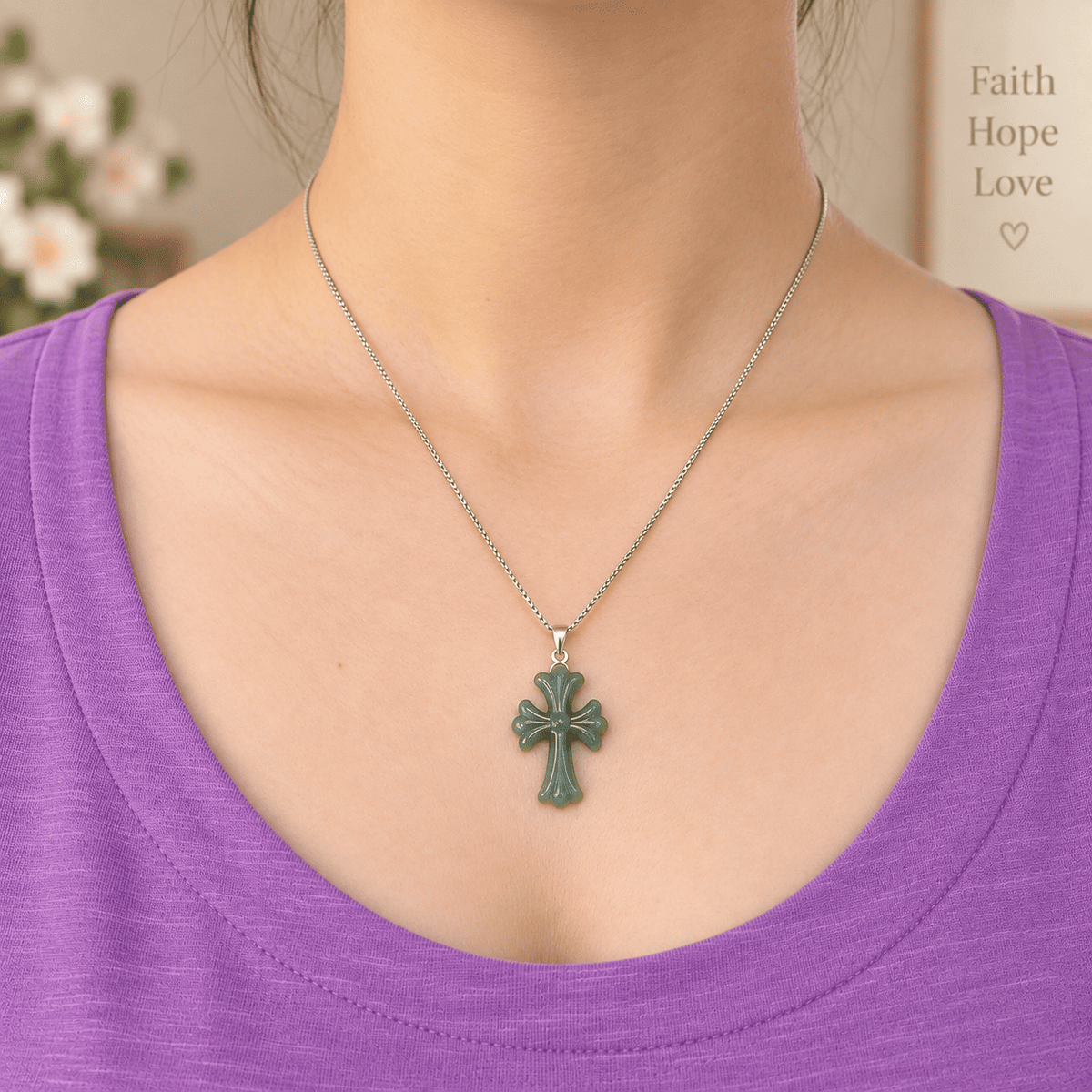 Front view of a natural Grade A blue water jadeite cross cross pendant