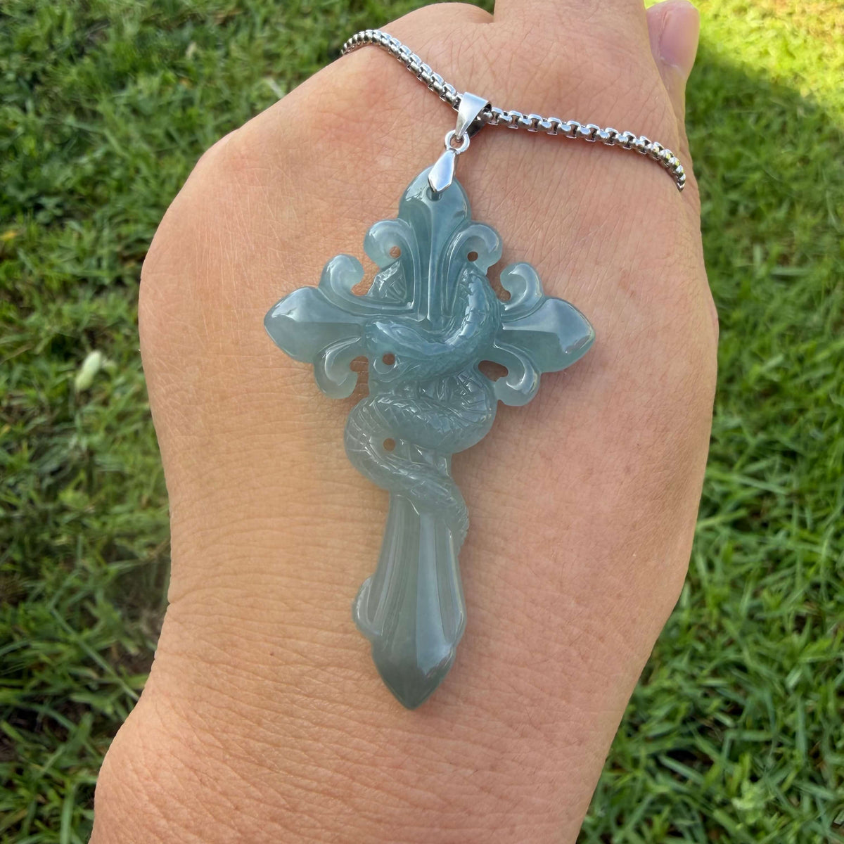 Blue water jadeite serpent cross pendant detailed view