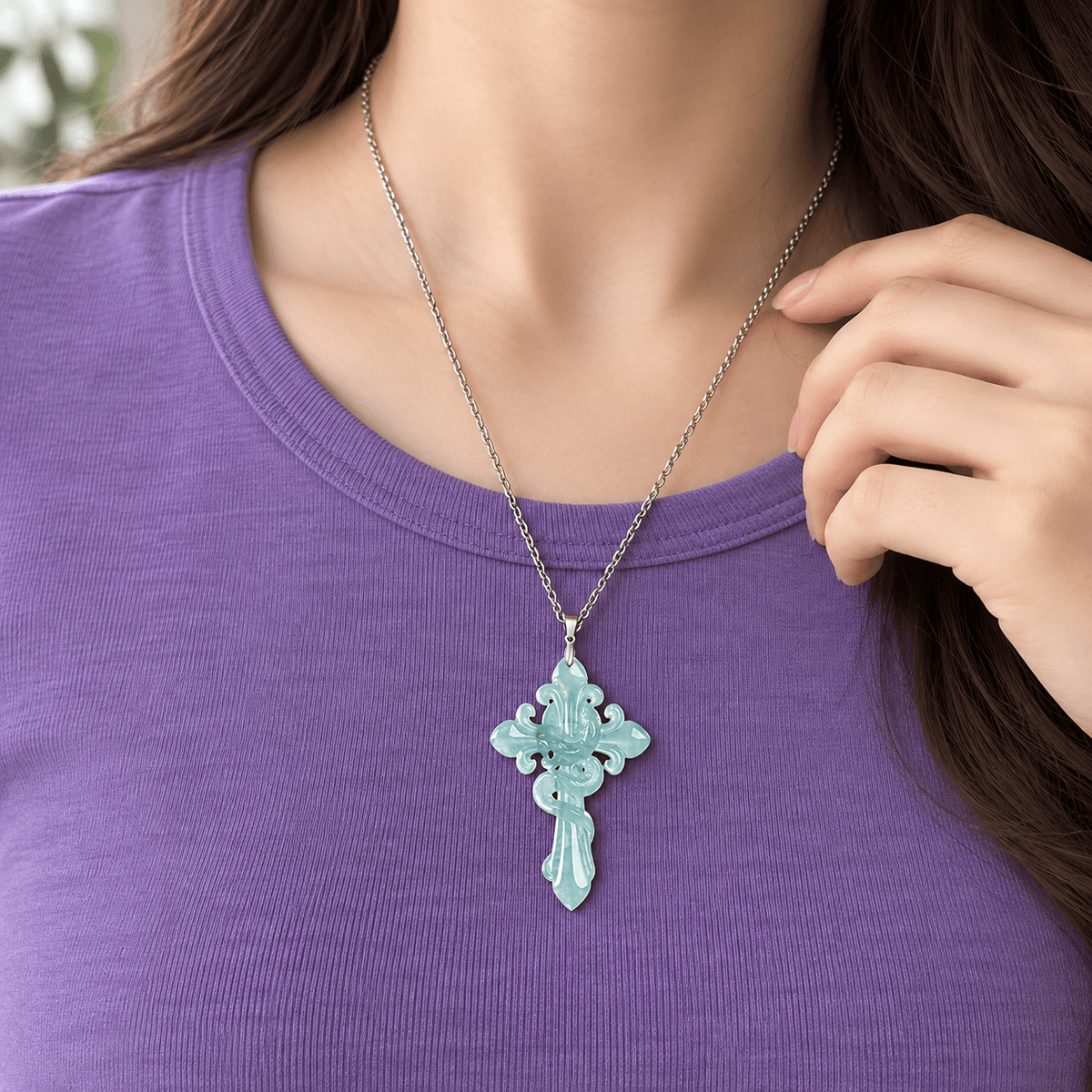 Blue water jadeite double-sided 3D serpent cross pendant necklace worn by a woman
