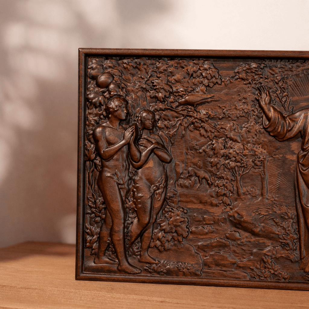 Close-up detail of hand-carved beechwood relief showing the Garden of Eden biblical artwork