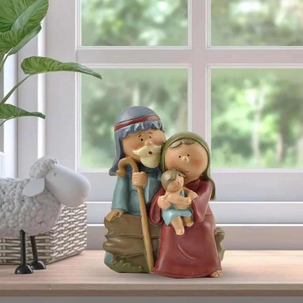 Holy Family Nativity figurine displayed by a window, featuring Mary, Joseph, and Baby Jesus in a cute resin design.