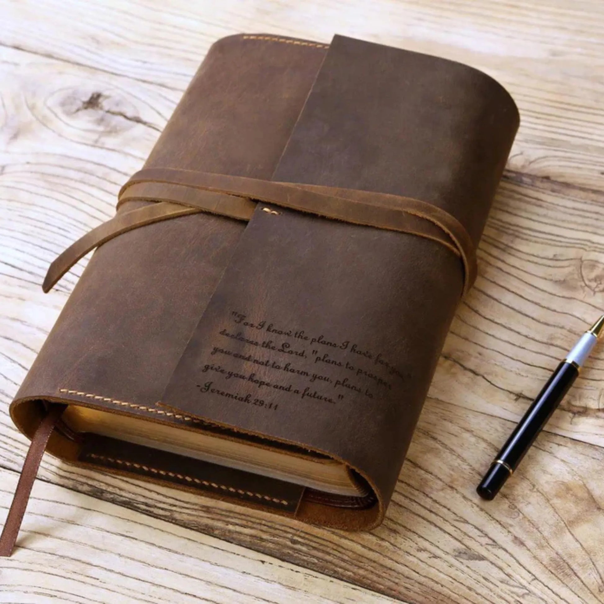Brown genuine leather Bible cover with wrap-around strap