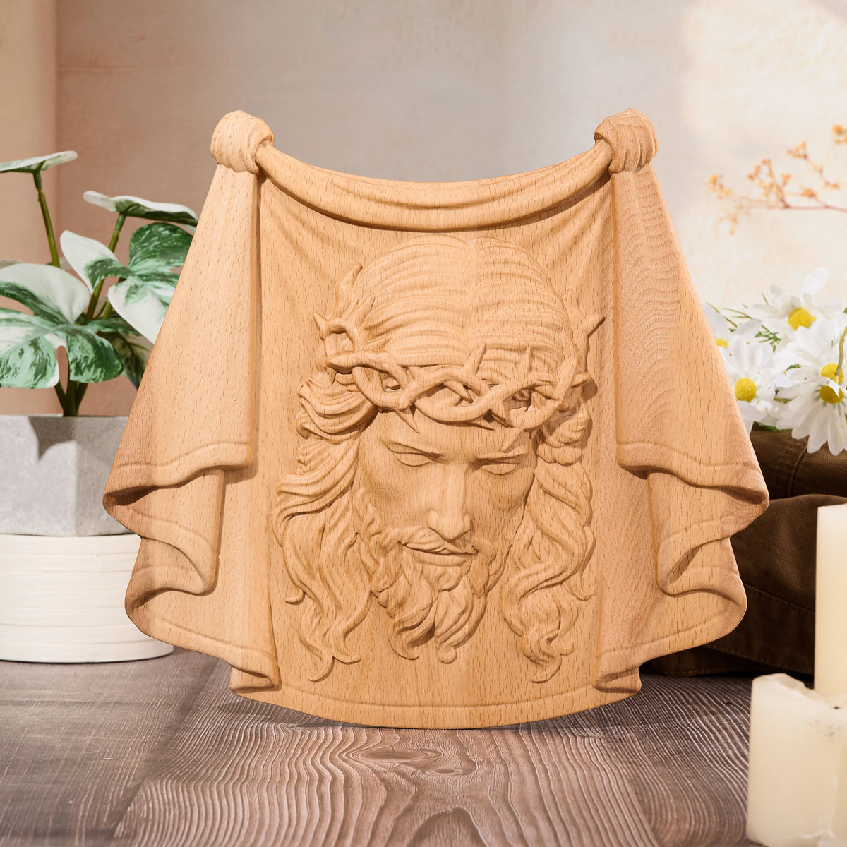 Natural wood Jesus relief carving with crown of thorns and detailed robe folds