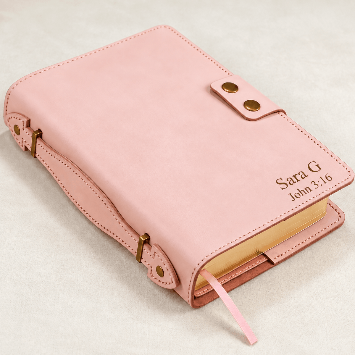 Personalized blush pink leather Bible cover with custom engraved name and Bible verse reference