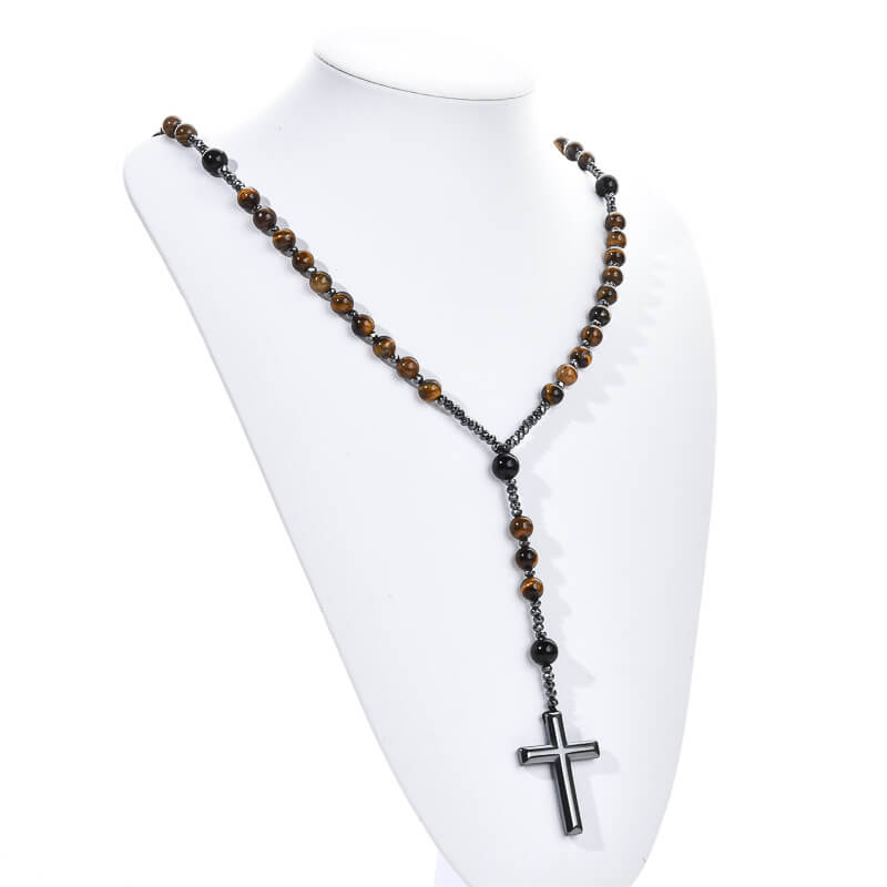 Natural Tiger's Eye rosary necklace with Hematite cross displayed on a white jewelry bust